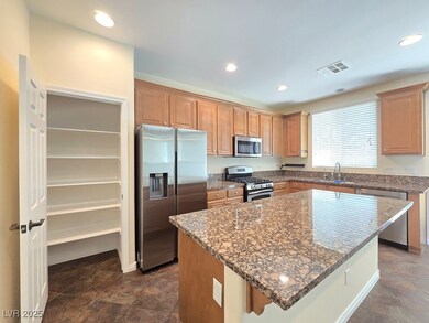 Kitchen featuring appliances with stainless steel