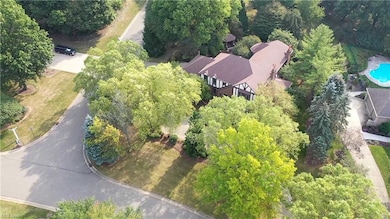 Gorgeous Tudor in a wooded lot/nearly One Acre.