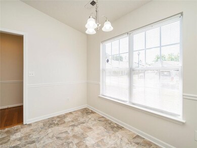 Breakfast/dining area with great natural light from front of home.