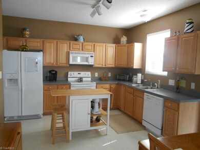 Kitchen.  Lots of cabinet and counter space.