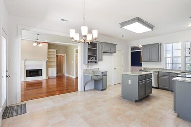 Newly renovated kitchen with tile flooring