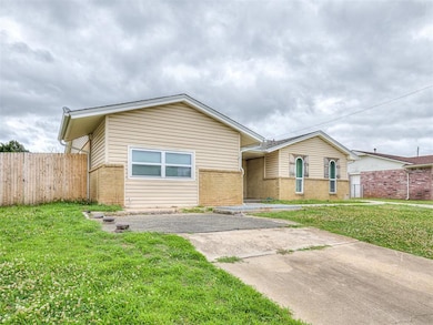 View of front of property with a front lawn
