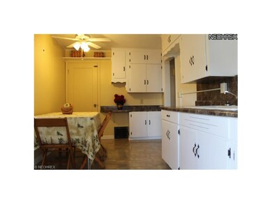 Beautifully updated kitchen with new laminate floo