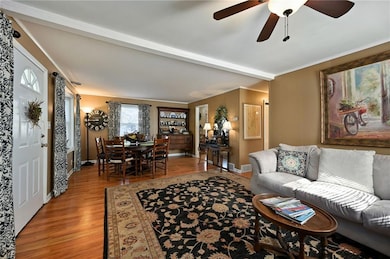 Open layout connecting the living and dining spaces for easy entertaining.