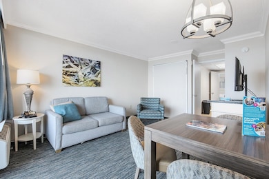 Interior space featuring ornamental molding, an in
