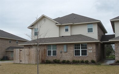 Back of property featuring central AC unit and a y