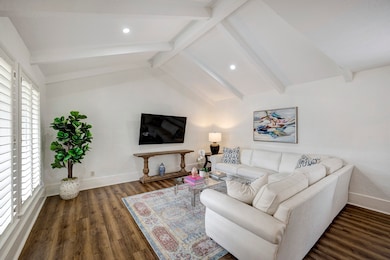 Light and bright living room with hi ceiling, and