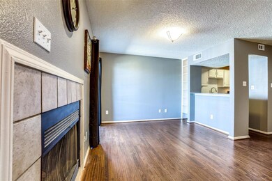 Living room looking toward kitchen