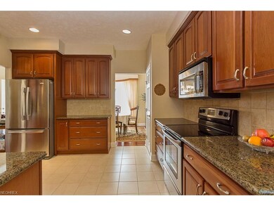 Gorgeous cherry cabinets, granite counters and stainless steel appliances.