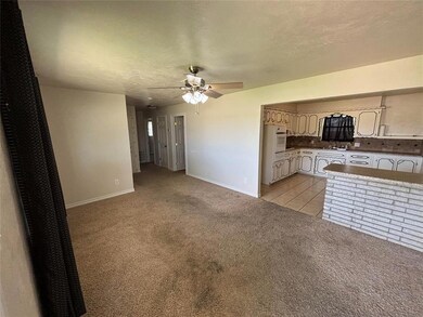 Unfurnished living room with ceiling fan, light ca
