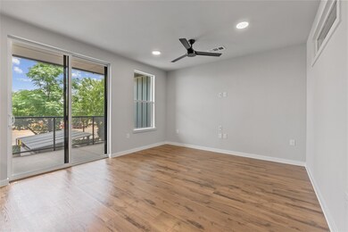 Spare room with a ceiling fan, recessed lighting,