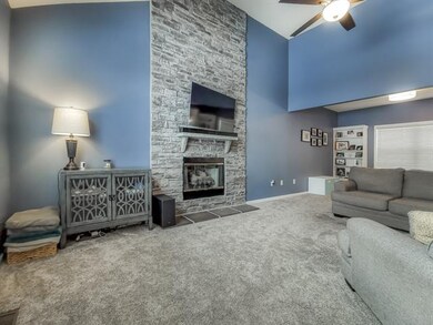 Family Room with updated stone fireplace.