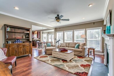 Cozy up for movie night in your  open great room with the warm gas fireplace