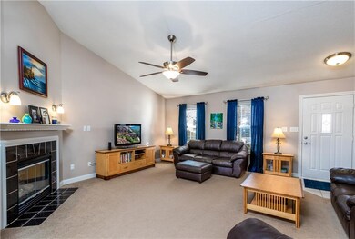 Walk into the front door and you're greeted with a soaring cathedral ceiling that runs through the great room and dining room.  Very spacious living area with gas direct vent fireplace.