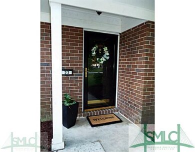 Exterior Front. Covered Porch & Storm Door