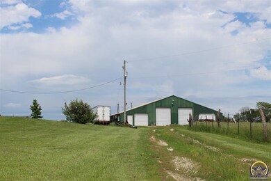 This large building has a paint booth inside as a separate room. Half Bath. Lots of space inside.