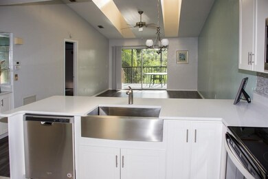 A view of the kitchen looking to the living room a