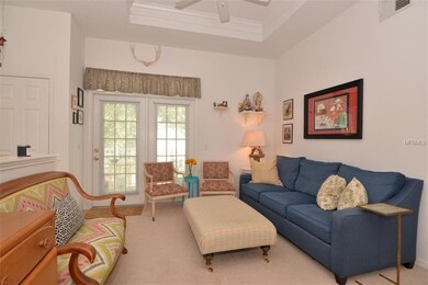 Living Room with Tray Ceiling