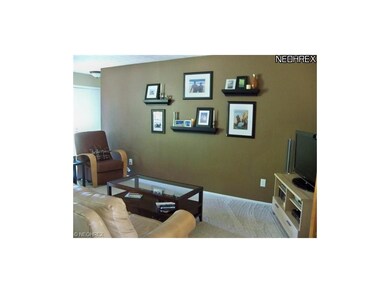 Great room has new neutral carpeting that you will