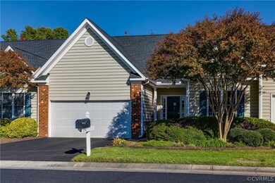 Attached 2 car garage & double-width paved drivewa