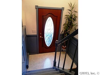 Foyer Notice the beautiful wooden front door!