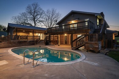 Twilight photo of the amazing pool/deck area