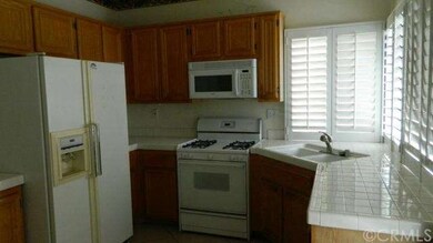 Kitchen Frig and stove included.