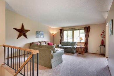 The main-level living room is huge and feels espec