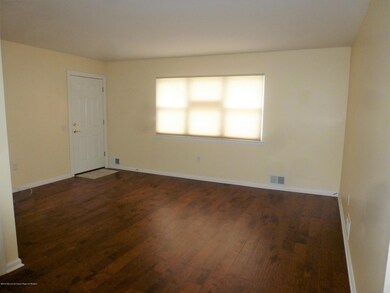 Living Room has new wood floor
