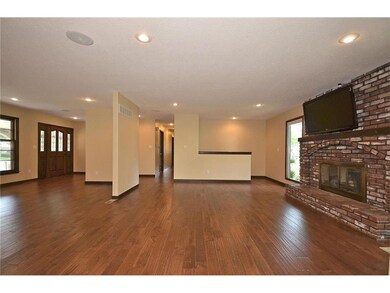 Different perspective of great room and living room.