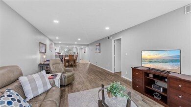 Living room featuring light wood finished floors, 