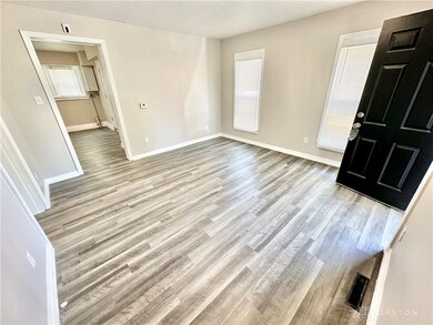 Freshly painted + new flooring thought out!