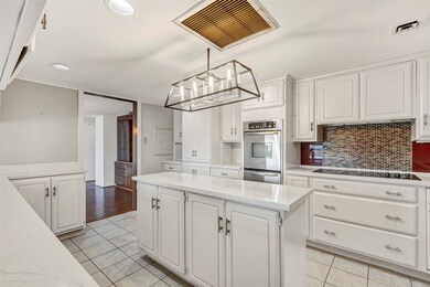 Welcome to the kitchen! Featuring a central island