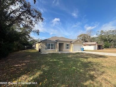 1159 Macfarlane Ave, Spring Hill, FL 34608 - photo 2