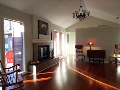 Hearth room next to the living room could be a for