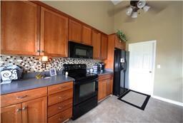 LARGE KITCHEN WITH BEAUTIFUL CABINETRY, COUNTERTOP