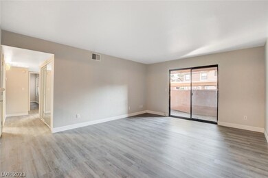 The view of the living room from the front door. T