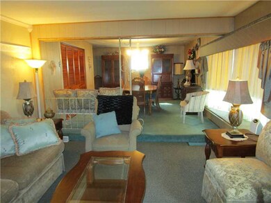 Living Room. The living room leads to the dining r