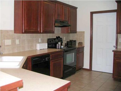 Beautiful maple cabinetry and main floor laundry