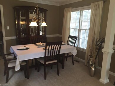 Formal dining + breakfast area within the kitchen.