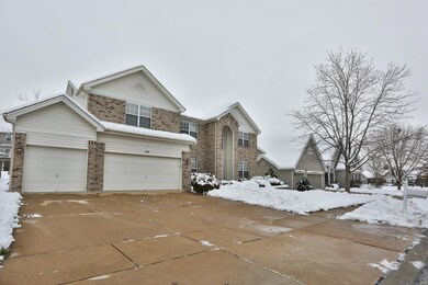 Concrete driveway leads to a three car 30x19 Garag