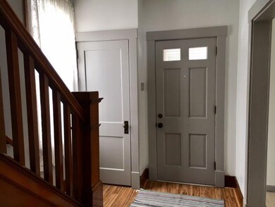 Foyer features closet and new flooring too!