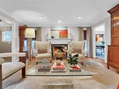 Inviting living room with gas fireplace, custom cu