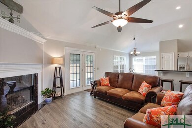 Foyer opens into a beautiful great room with corne