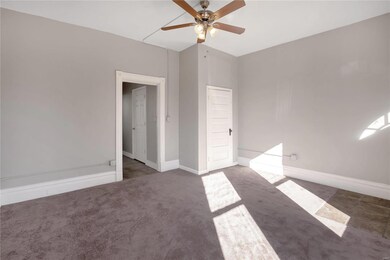 Unit 1 - Living room w/ coat closet