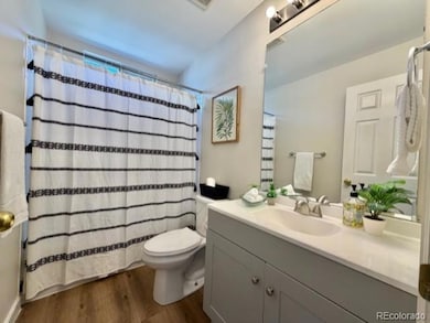 Updated bathroom near kitchen and between bedrooms