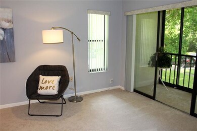 Spacious living room opens to the lanai that overl