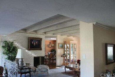 Living Room with Formal Dining in Background