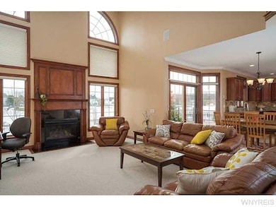Family Room. Two story family room with gas fp, be
