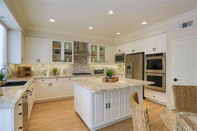 This angle of the kitchen shows the walk-in pantry